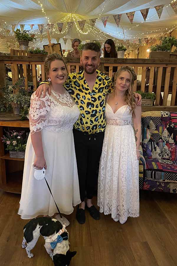 Brides with dog at wedding